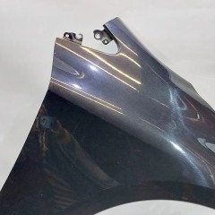 BŁOTNIK PRZÓD PRAWY TOYOTA COROLLA E21 19r SEDAN