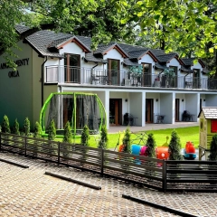 Domki , pokoje , apartenty . Wypocznij nad jeziorem z Apartamentami Orla .